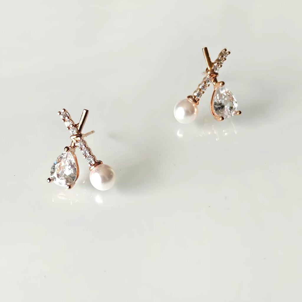 Korean gold plated X shape fancy zircon stud earrings — minimalist everyday earrings for women India