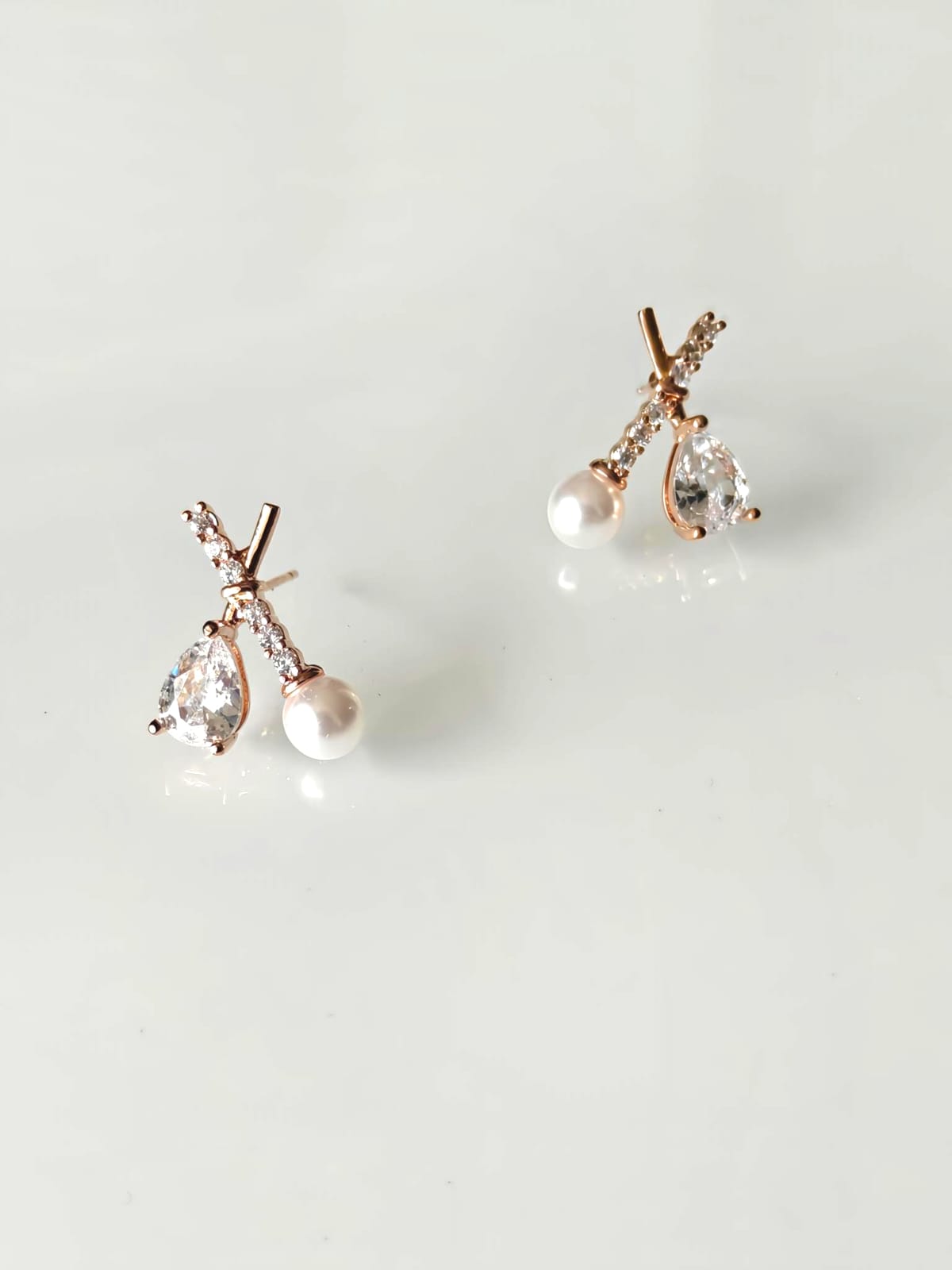 Korean gold plated X shape fancy zircon stud earrings — minimalist everyday earrings for women India