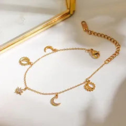 Gold plated anti-tarnish star moon charms bracelet — waterproof everyday jewellery for women India


