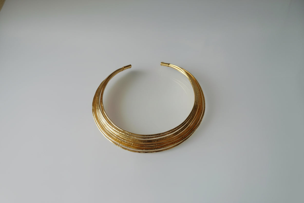 Stylish Gold Color Amrapali Hansli Necklace