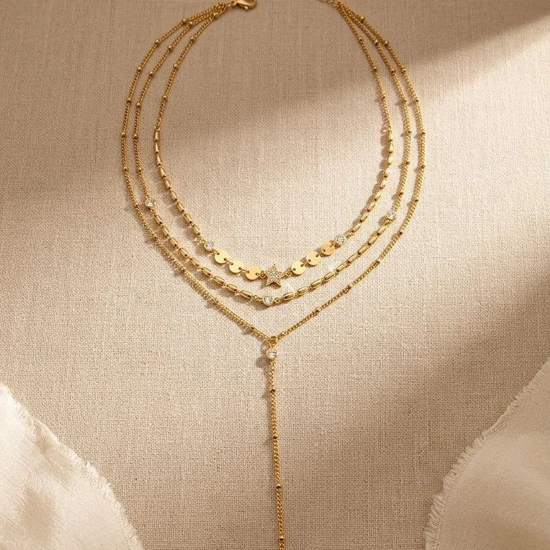 Gold plated asymmetrical star layered necklace for women – Oneofé