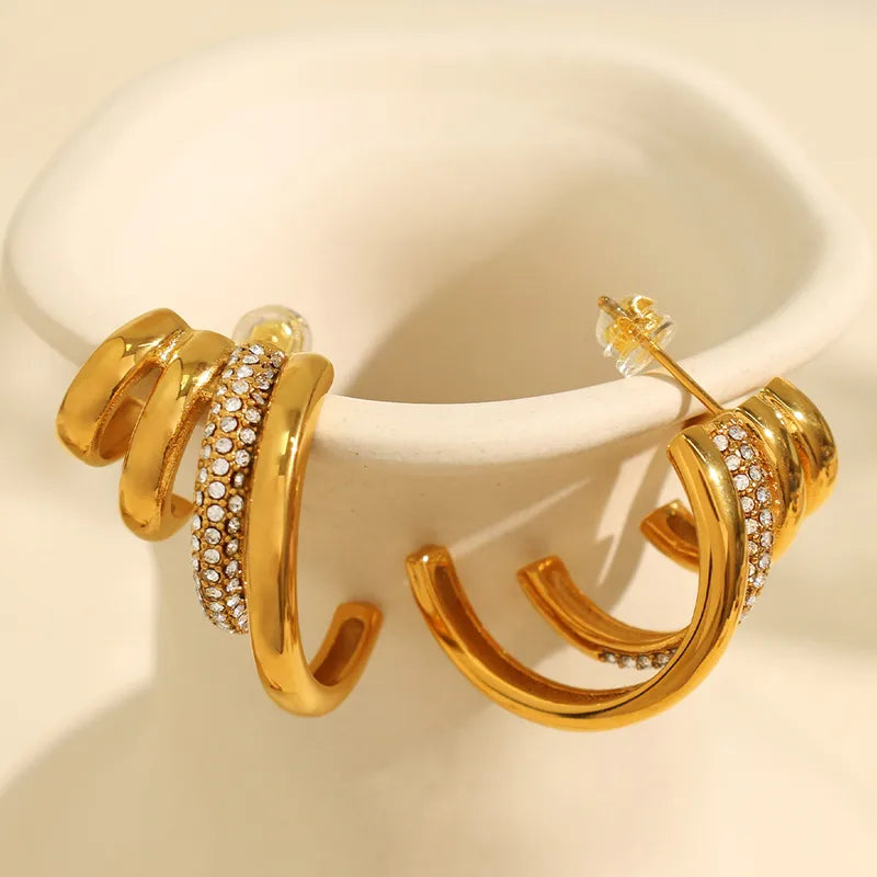 18K gold plated geometric zircon stud earring on model — elegant everyday jewellery