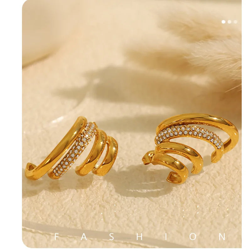 Gold PVD geometric zircon earring flat lay — dainty luxury jewellery gift for her