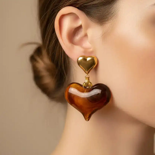 Handmade heart shape gold plated stud earrings angle view— romantic everyday jewellery for women