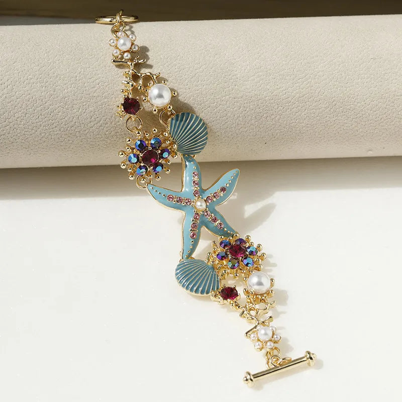 Hawaiian marine scallop starfish pearl rhinestone bracelet — beach vacation jewellery for women