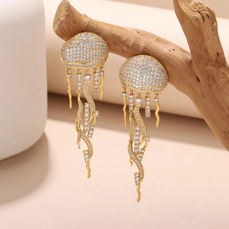 Gold Plated Copper Zircon Inlay Ocean Pattern Tassel Drop Earrings product shot – handcrafted statement earrings for women – Oneofé