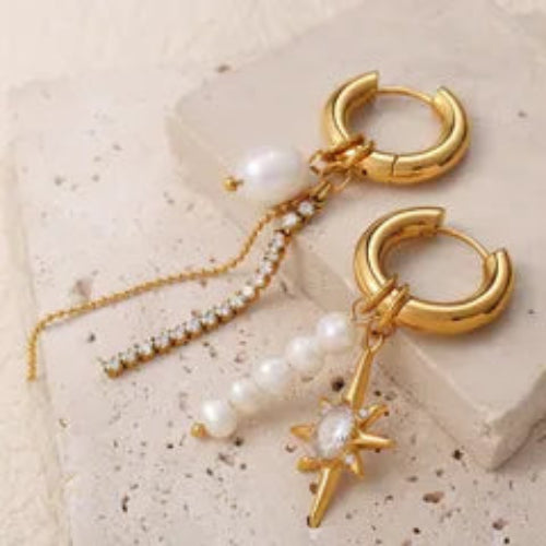Close-up gold hexagram geometric luxurious earrings – glam statement jewellery for women – Oneofé
