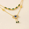 lightweight Evil eye gold plated layered necklace with blue zircon close up detail — minimalist office wear jewellery for women