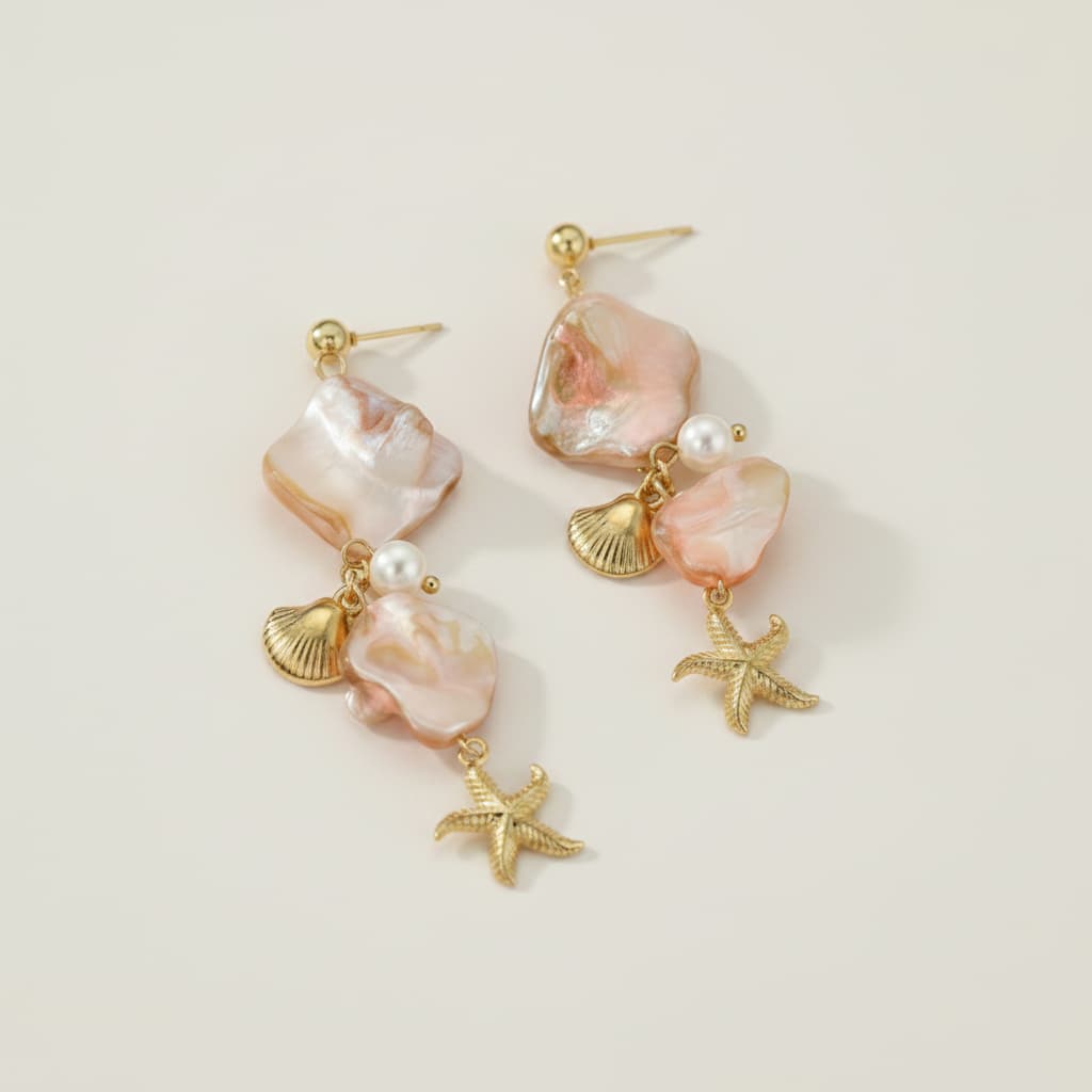 Gold plated scallop starfish drop earrings on model — beach vacation statement earrings for women India