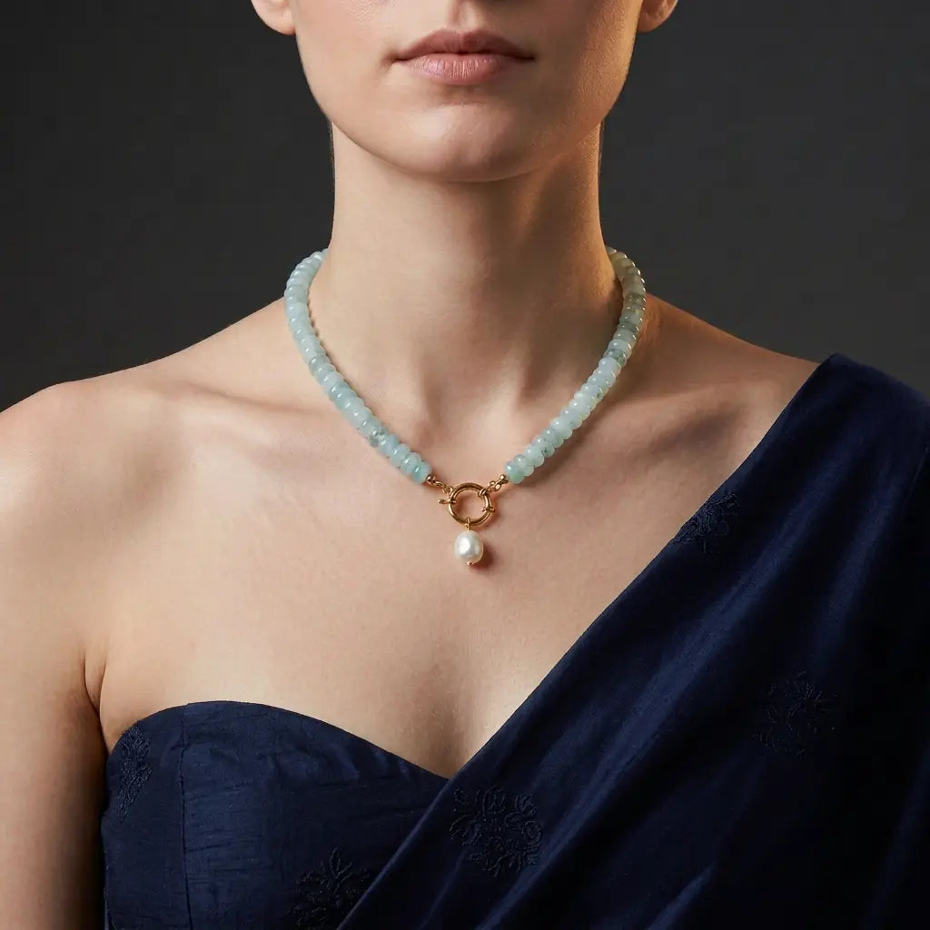 Gold-plated aqua beaded necklace with freshwater pearl on midnight blue blouse – festive jewellery for women – Oneofé